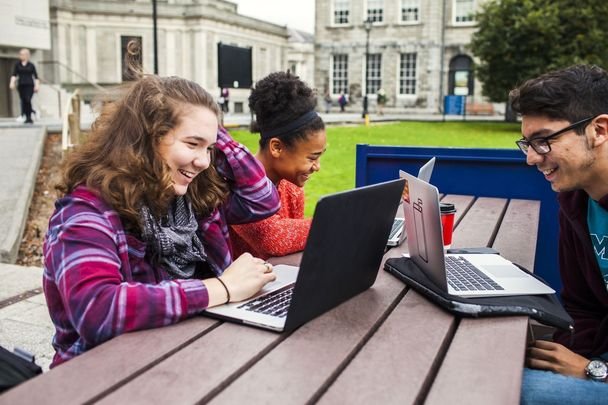 cropped_Trinity_College_Dublin_students_computers_quad_Getty